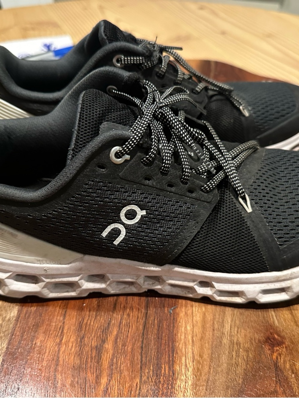 On Running Men’s Athletic Running Shoes in Black and White